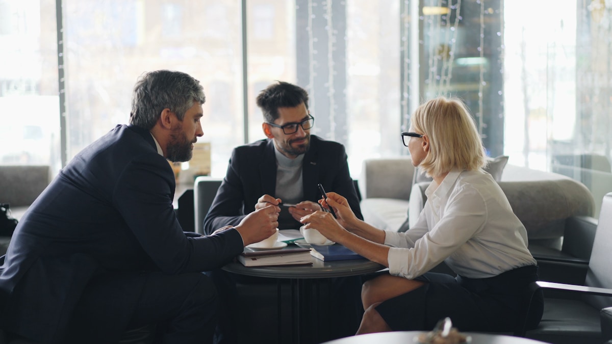 Group of investors analysing a real estate project
